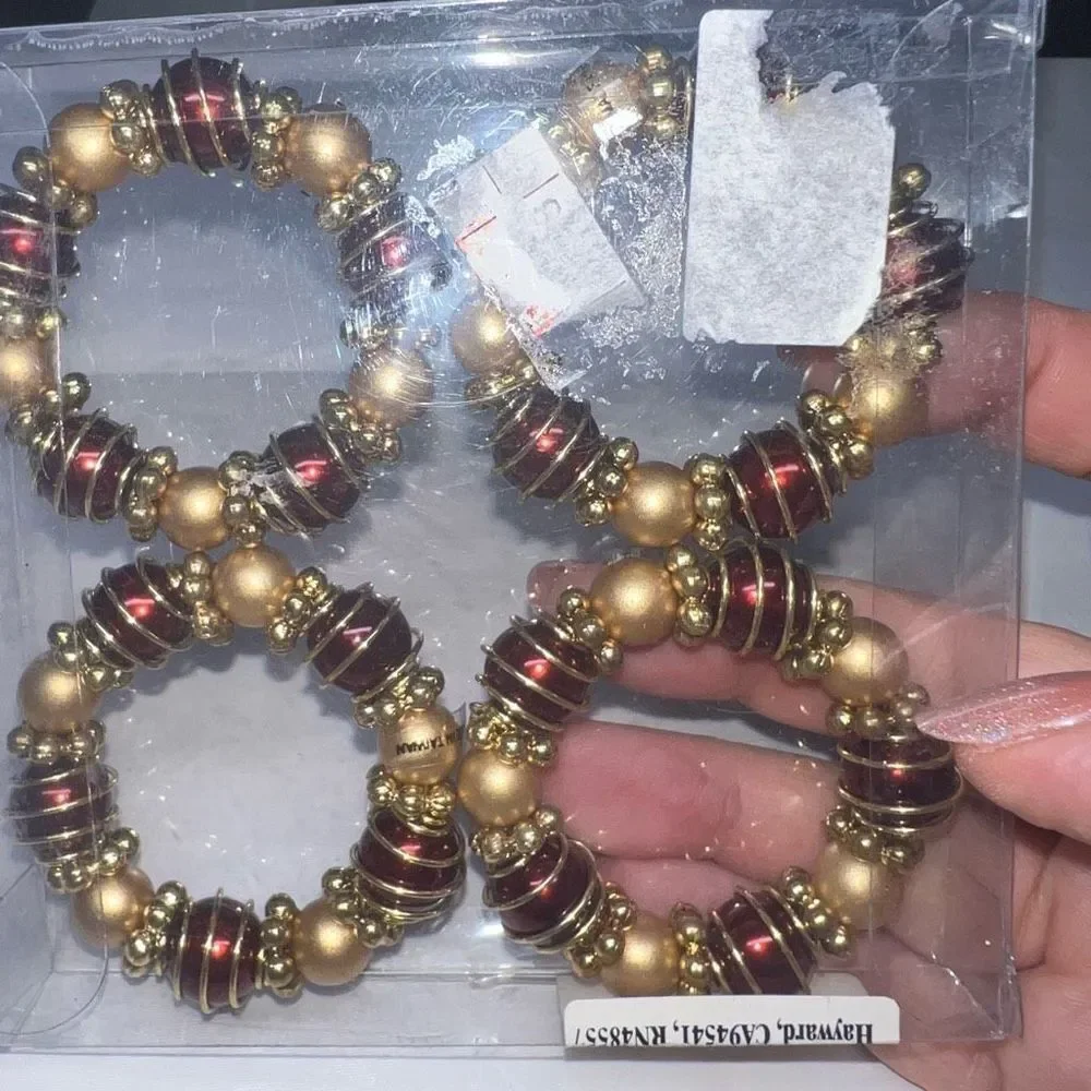 Set of Four Gold and Red Beaded Napkin Holders